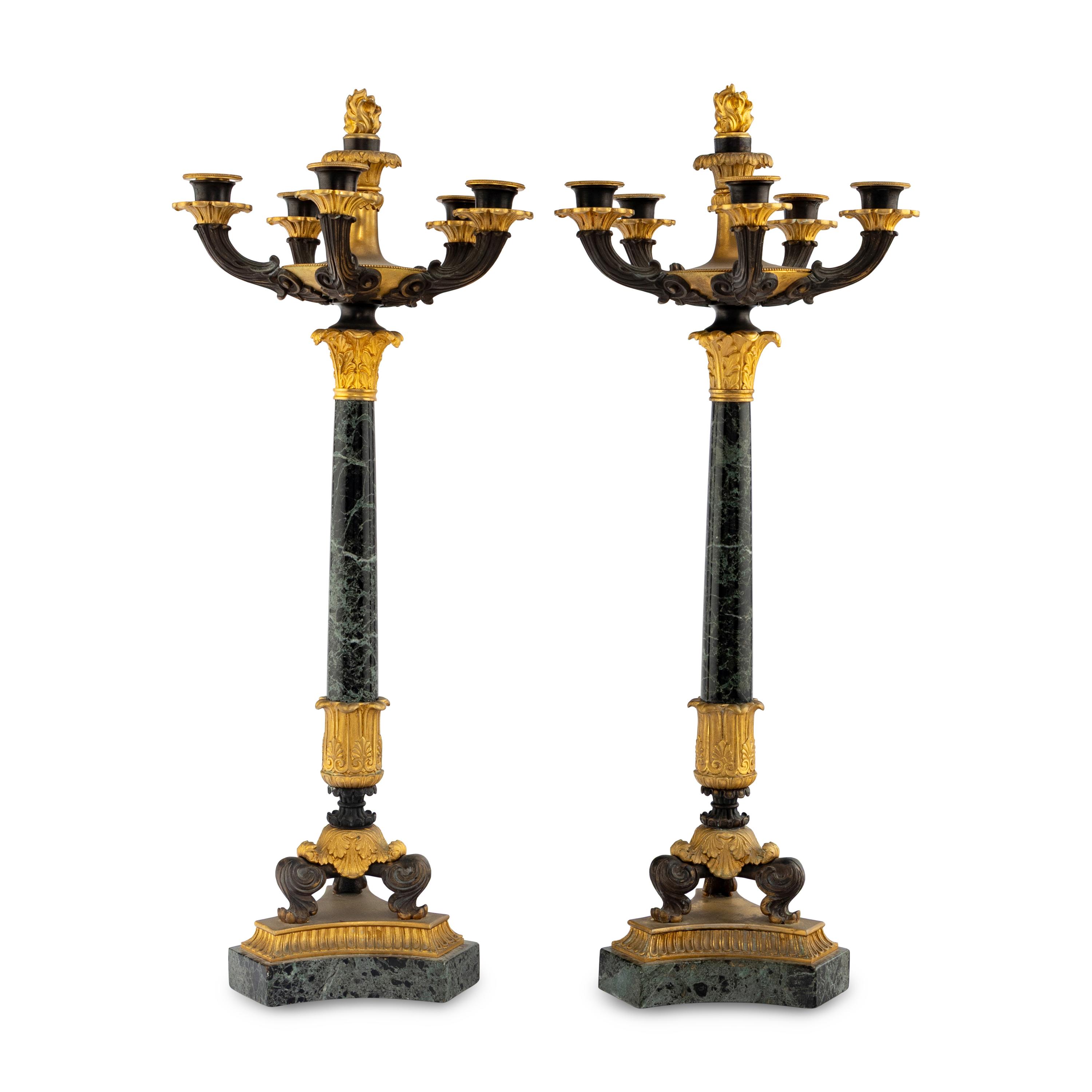 A Pair of Charles X Gilt and Patinated Bronze Mounted Marble Seven-Light Candelabra