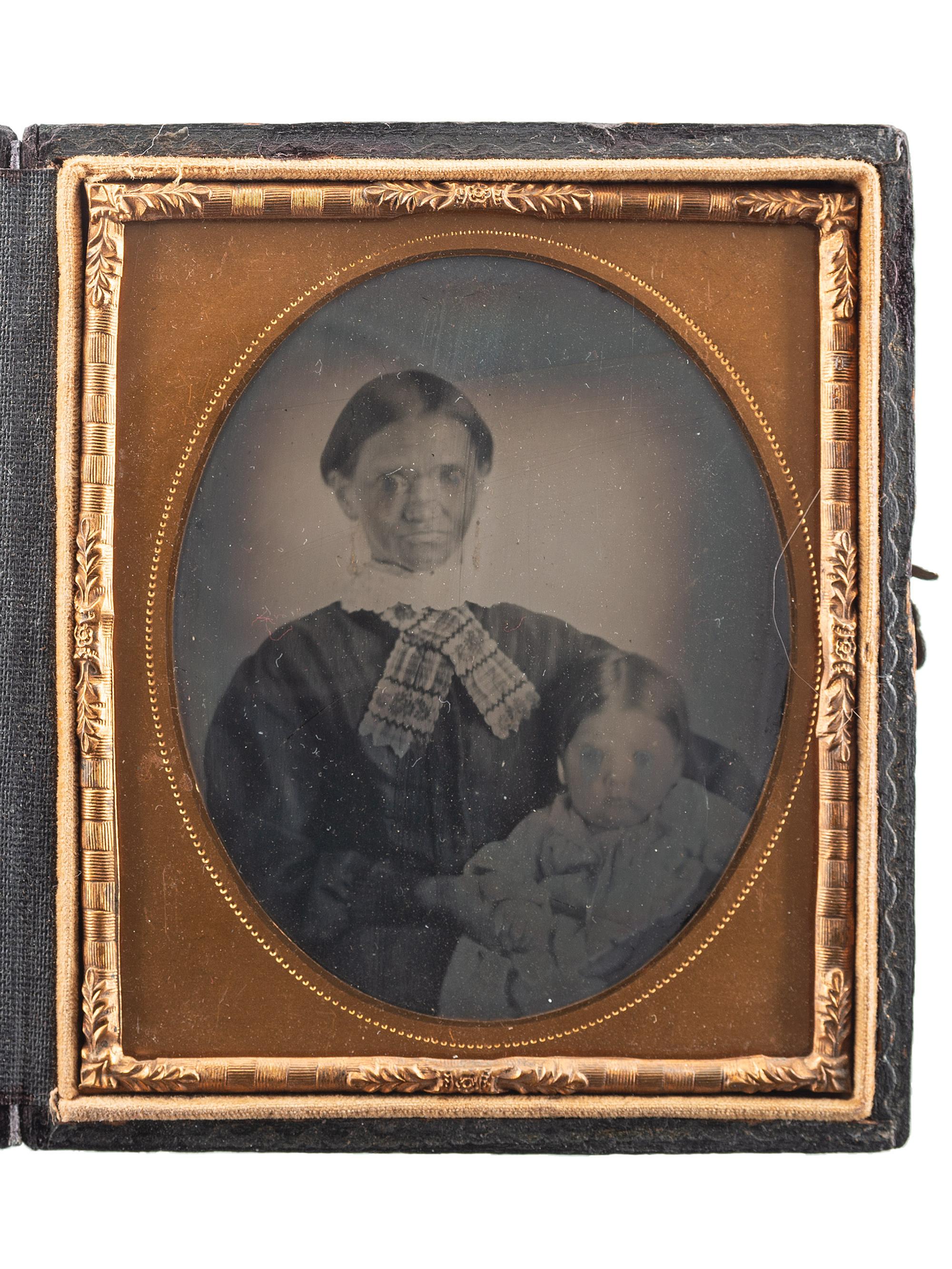 [EARLY PHOTOGRAPHY]. A group of 3 sixth plate ambrotypes of African American women and white children, comprising: