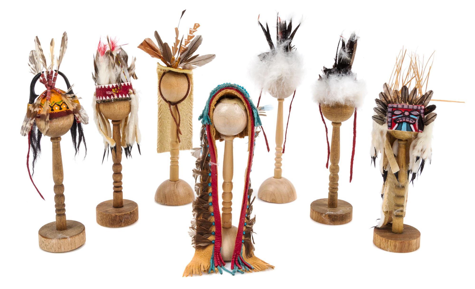 A Group of Seven Native American Style Headdresses Length of longest 4 1/4 inches. — Brian "Rainbow Hand" and Kathy Tepper