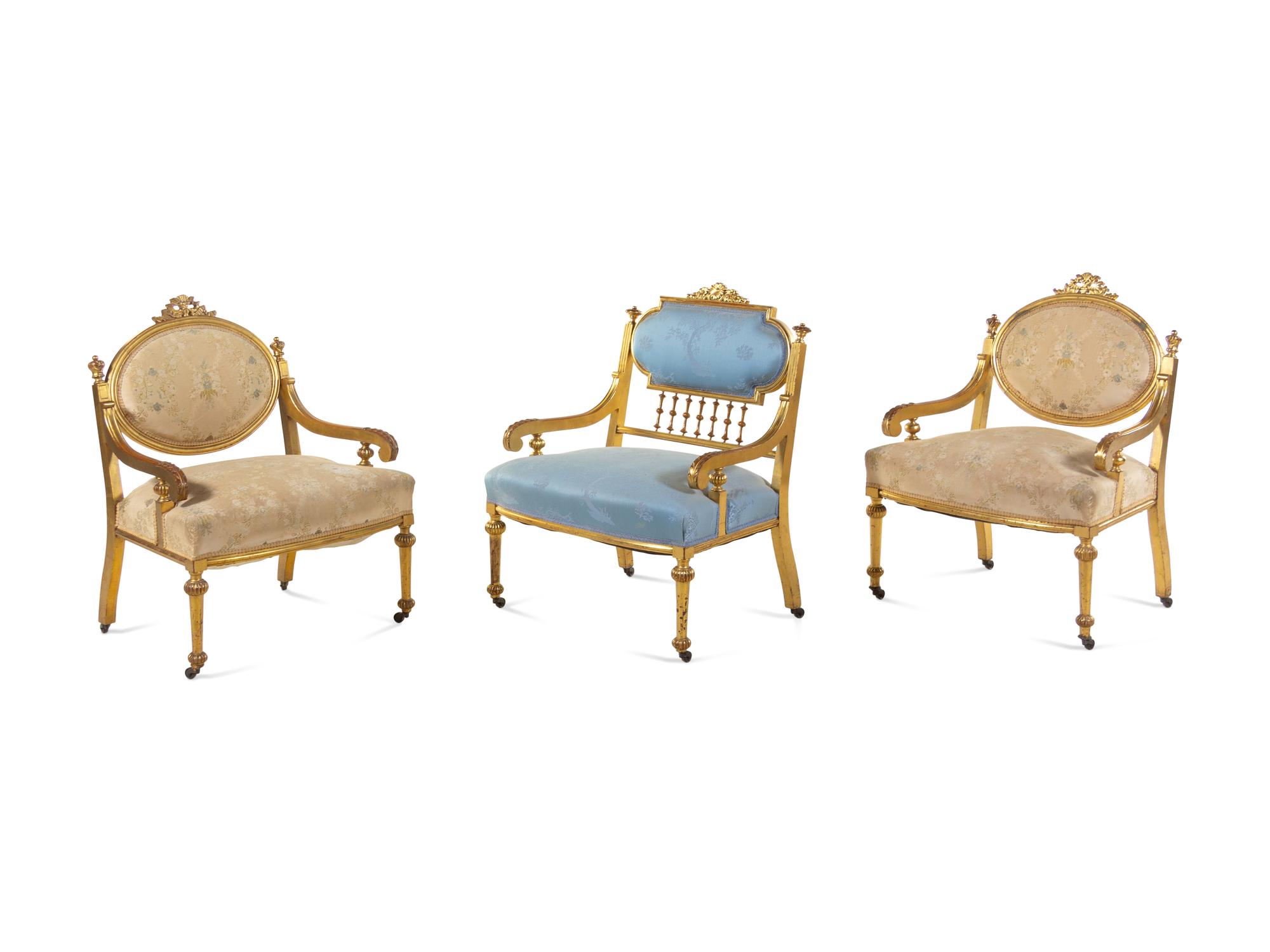 Three Louis XVI Style Carved Giltwood Fauteuils