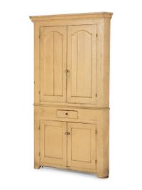 A Federal Yellow Painted Poplar or Pine Corner Cupboard
