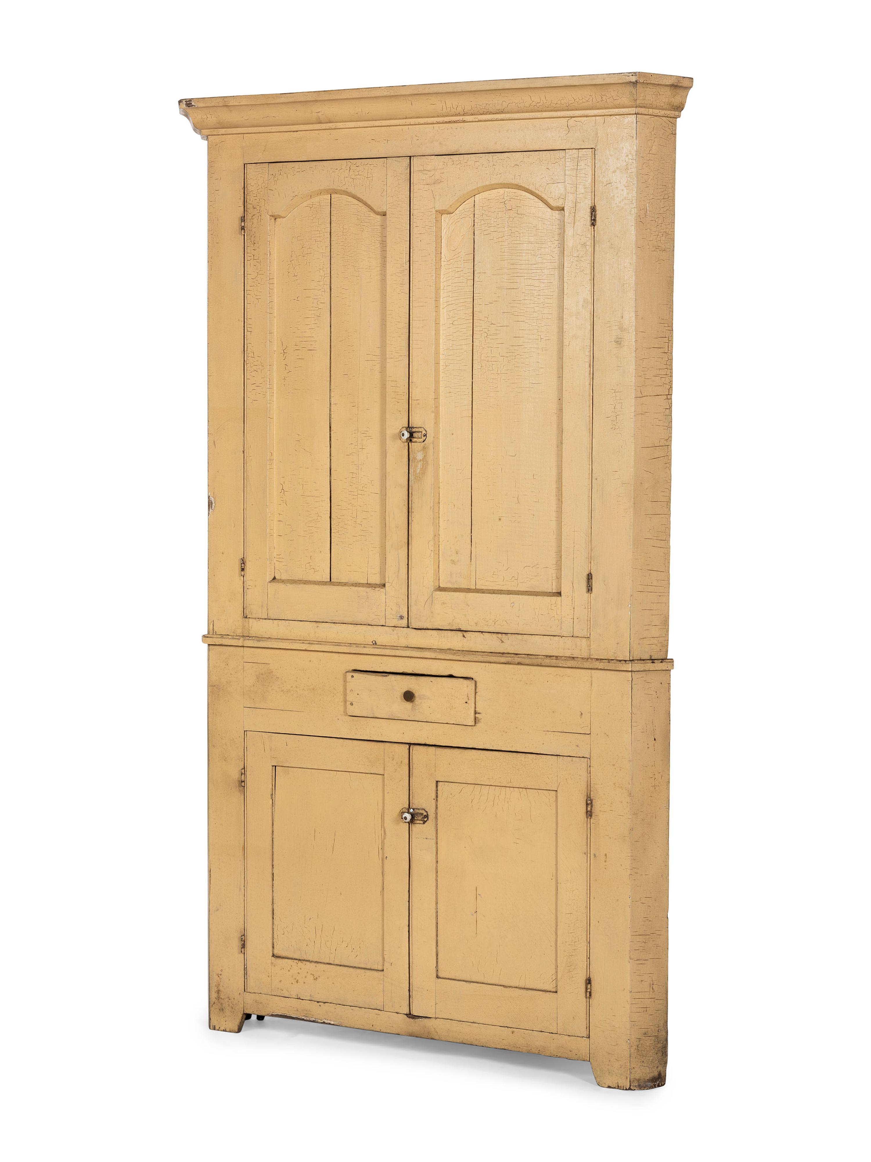 A Federal Yellow Painted Poplar or Pine Corner Cupboard