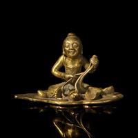 A Small Chinese Bronze Figure of a Boy with Lotus, Qing Dynasty — 清 銅鎏金荷葉童子