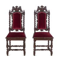 A Pair of Renaissance Revival Carved Walnut Side Chairs