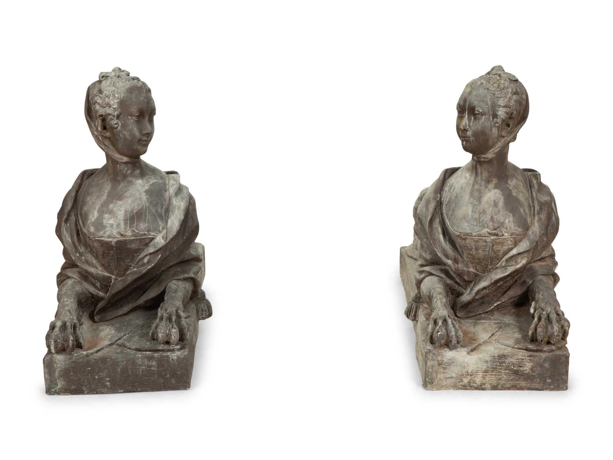 A Pair of Patinated Fiberglass Sphinxes