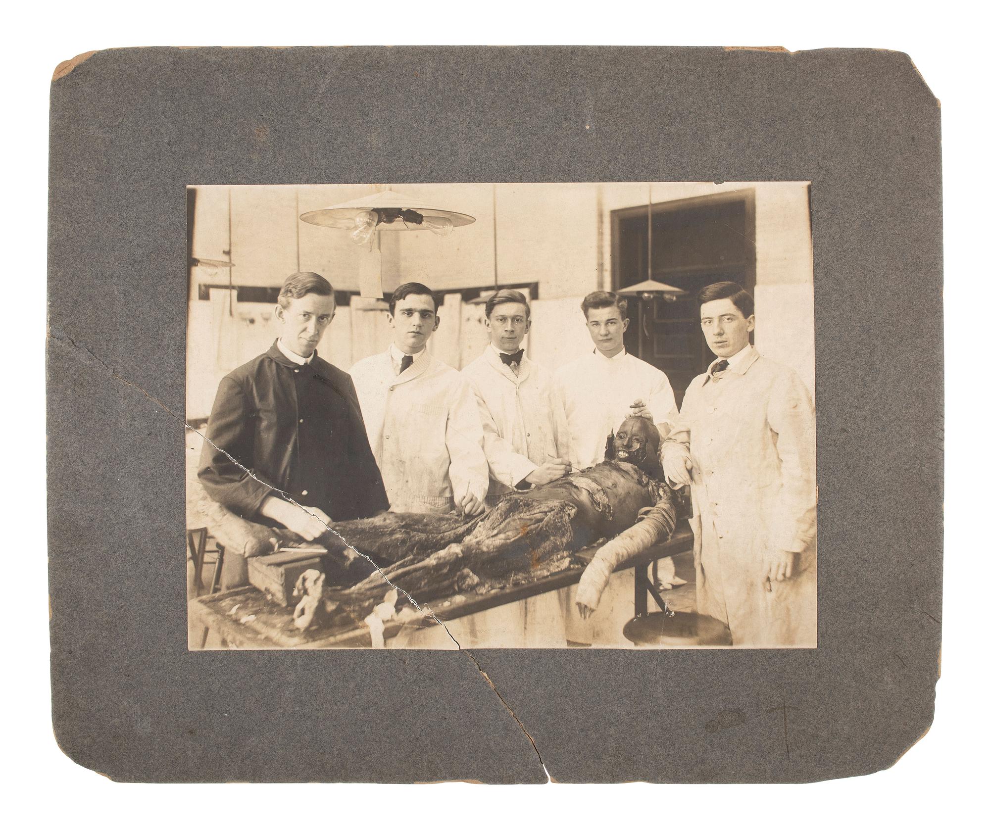 [MCKINLEY, William]. 2 photos of the dissection of the body of Czolgosz's apprehender. Ca 1908.