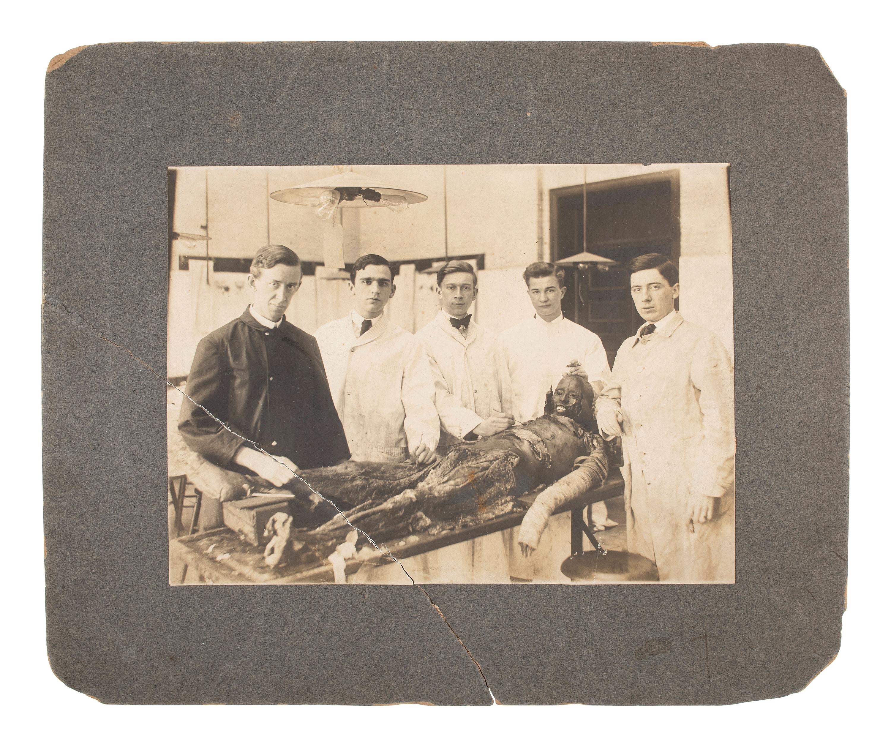 [MCKINLEY, William]. 2 photos of the dissection of the body of Czolgosz's apprehender. Ca 1908.