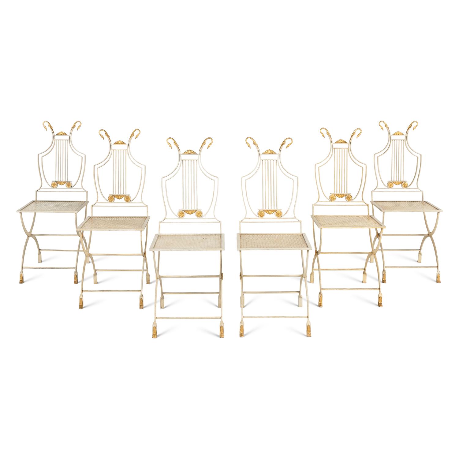 A Set of Six Neoclassical Style Cream-Painted and Parcel Gilt Garden Chairs