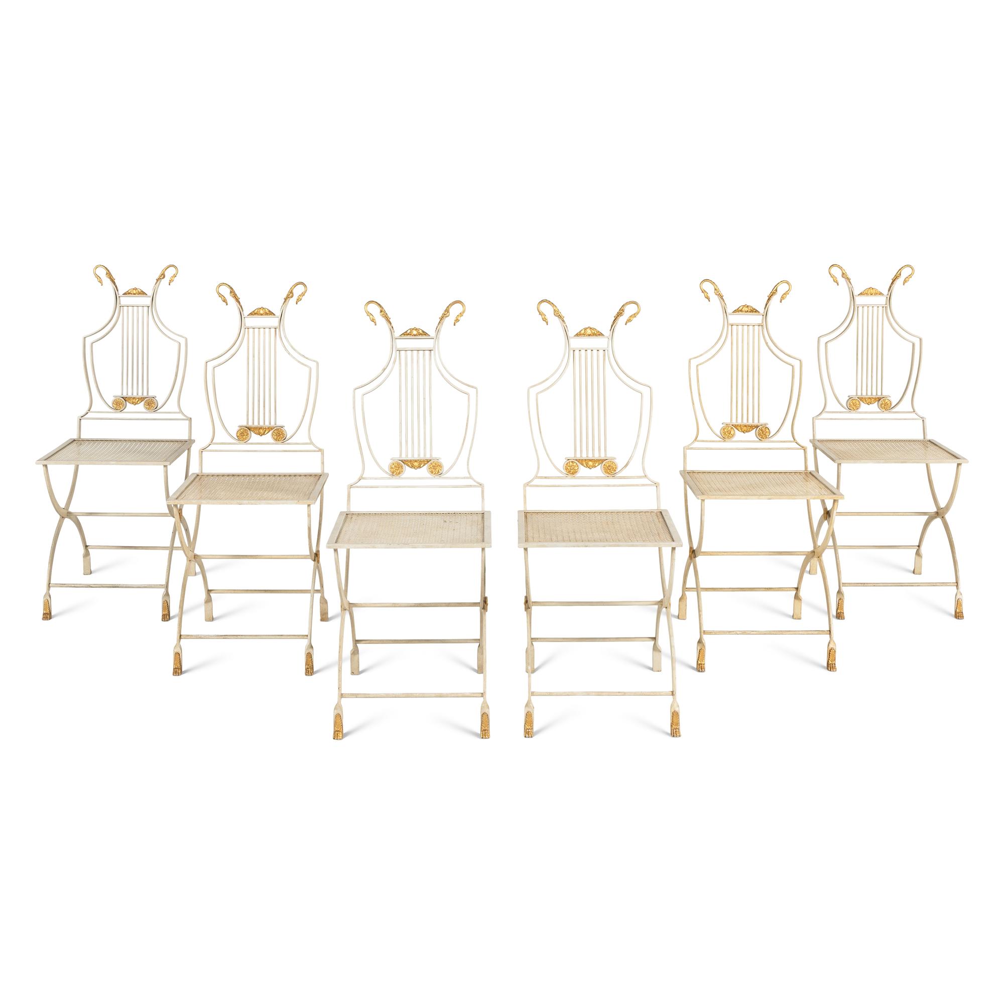 A Set of Six Neoclassical Style Cream-Painted and Parcel Gilt Garden Chairs