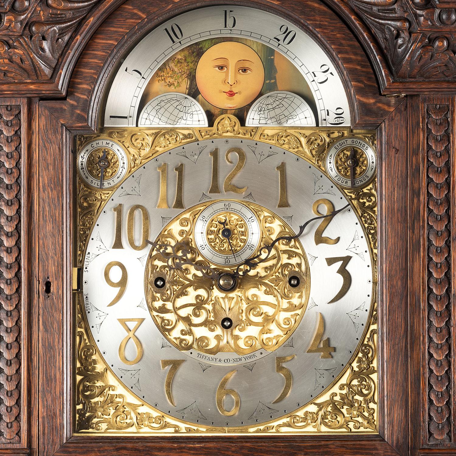 A Renaissance Revival Carved Oak Tall Case Clock