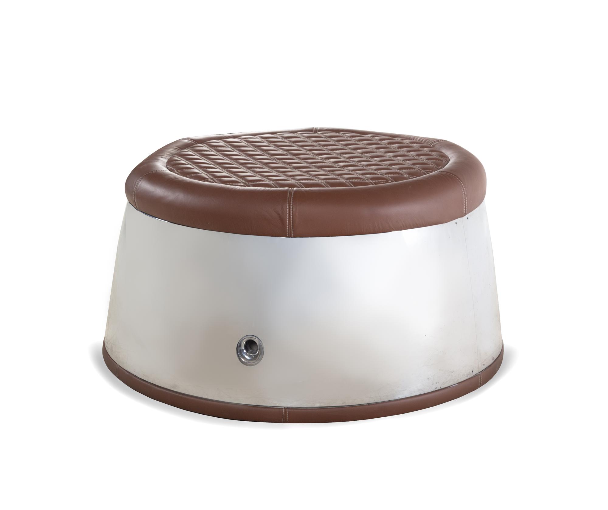A Polished Aluminum "Aviator" Ottoman