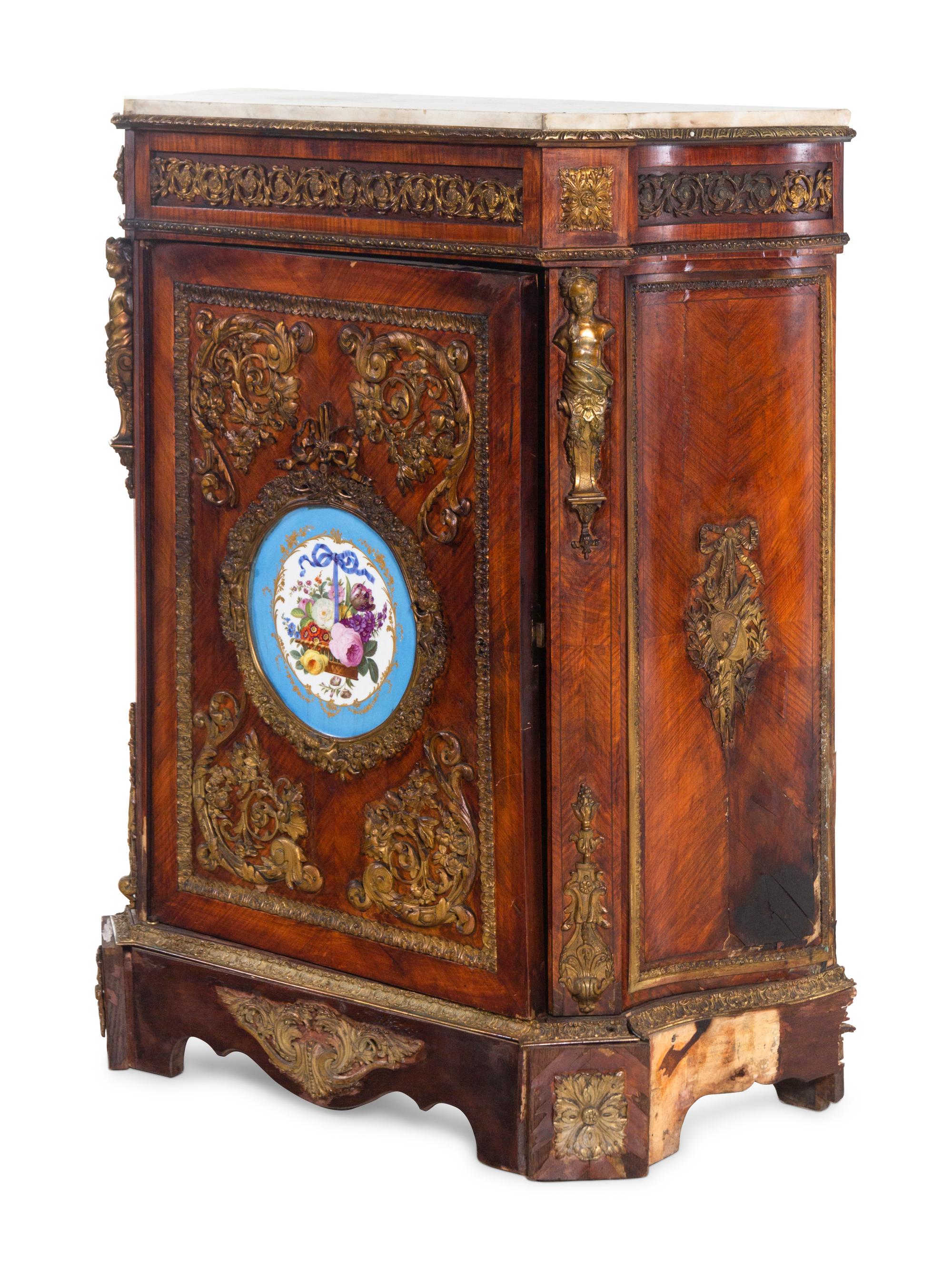 A Napoleon III Style Gilt Bronze and Porcelain Mounted Cabinet