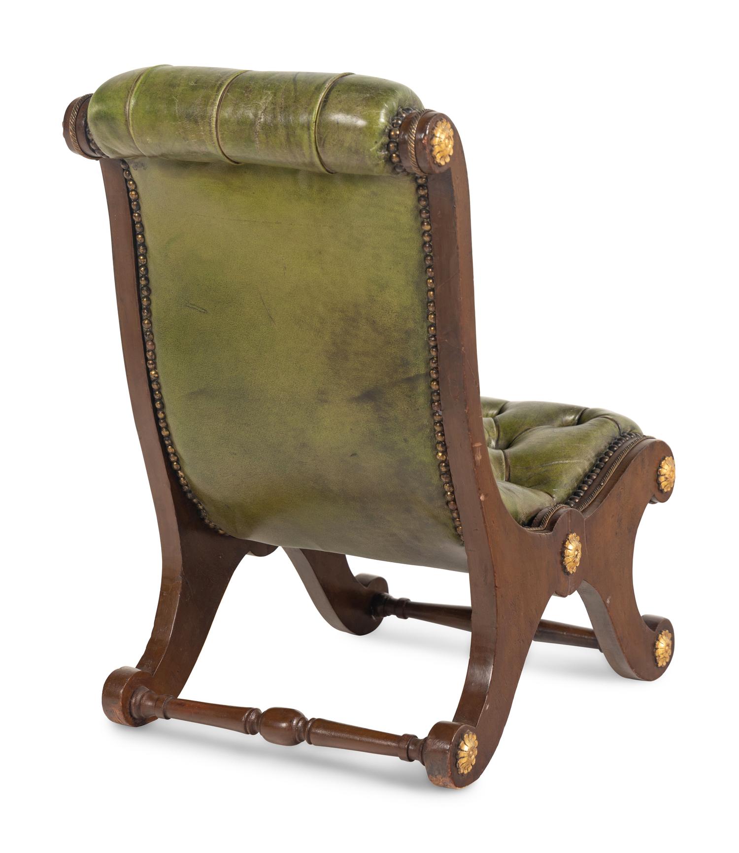 A Pair of Late William IV Leather-Upholstered Mahogany Gout Chairs