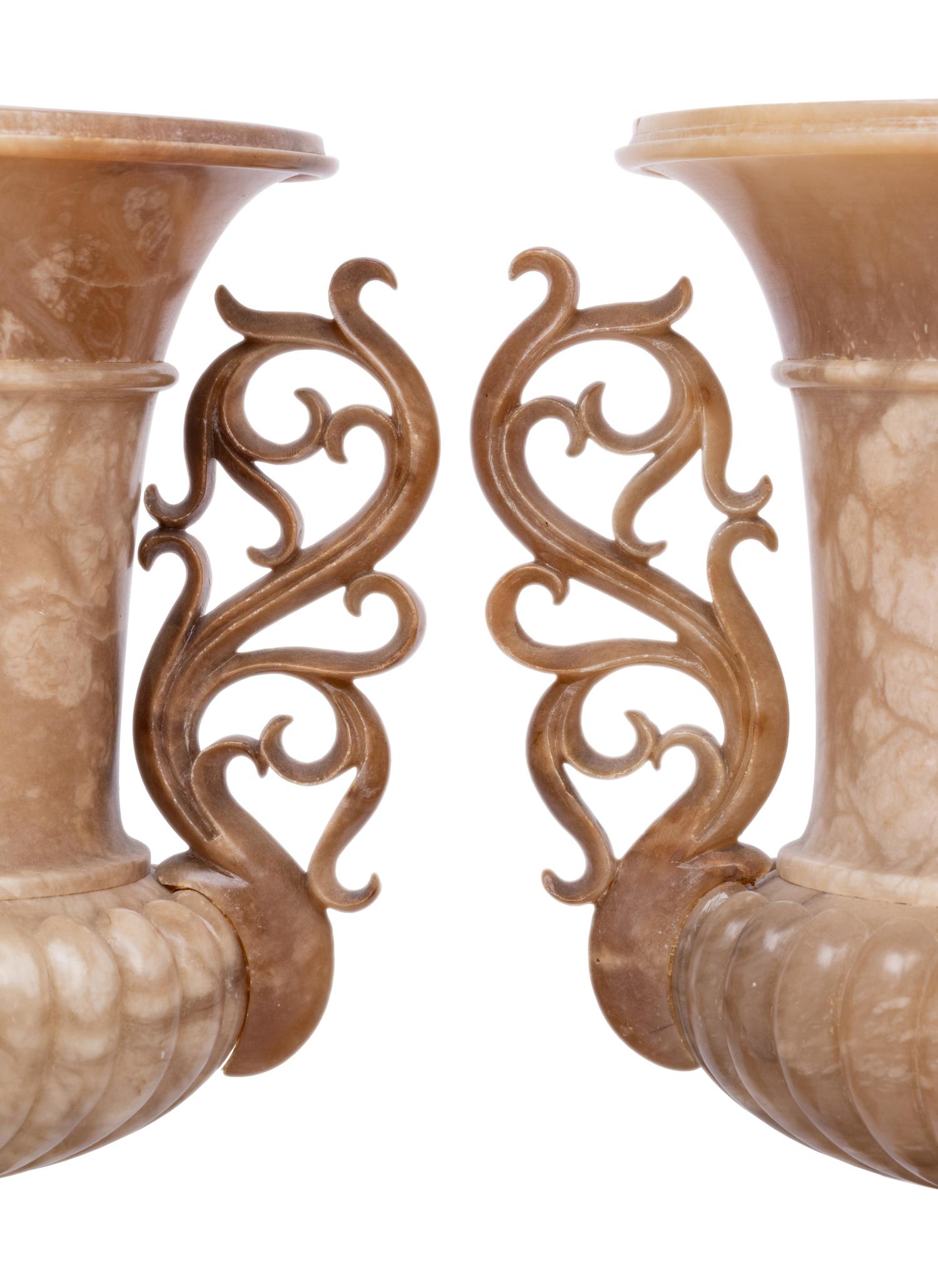 A Pair of Carved Alabaster Urns