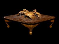 A Japanese Gold and Black Lacquer 'Dragon Turtle' Square Stand