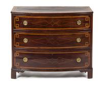 A Regency Mahogany and Satinwood Chest of Drawers, EARLY 19TH CENTURY, Height 33 x width 39 1/2 x depth 19 1/4 inches. — EARLY 19TH CENTURY,