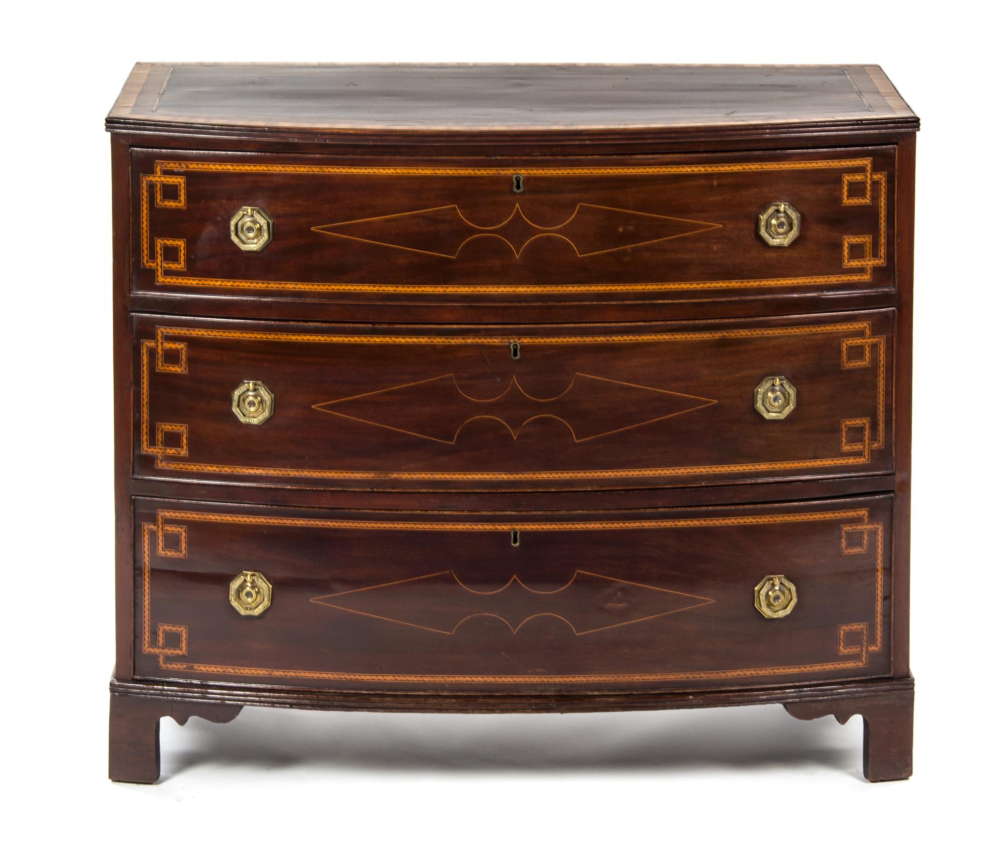 A Regency Mahogany and Satinwood Chest of Drawers, EARLY 19TH CENTURY, Height 33 x width 39 1/2 x depth 19 1/4 inches. — EARLY 19TH CENTURY,