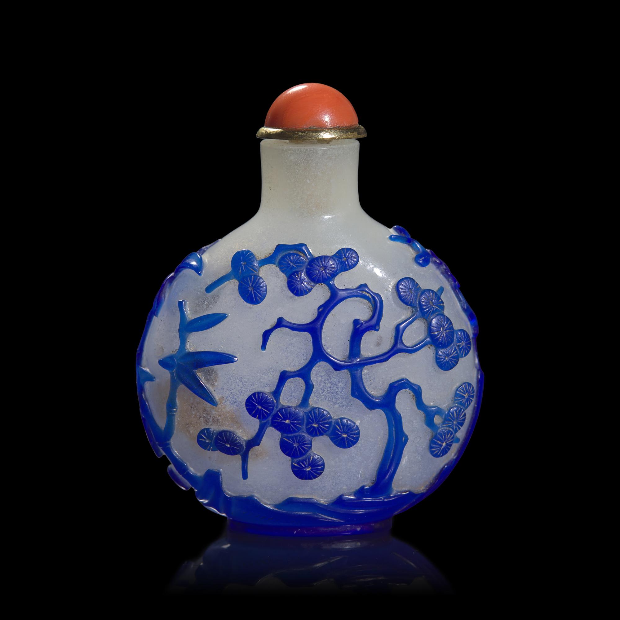 A Chinese Blue Overlaid Glass "Phoenix and Pine" Snuff Bottle