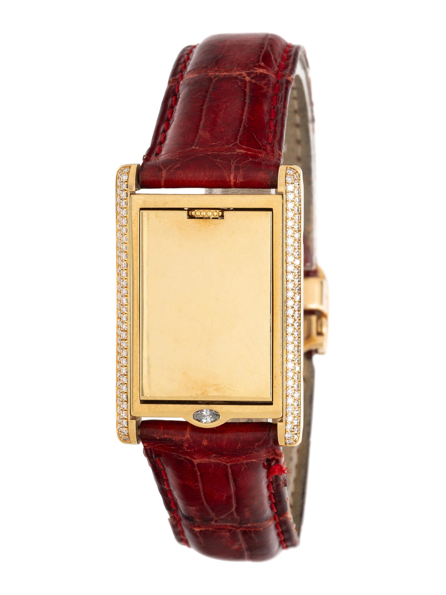 CARTIER, REF. 2506 18K YELLOW GOLD AND FACTORY DIAMOND 'TANK BASCULANTE' WATCH WITH CARTIER DEPLOYANT BUCKLE