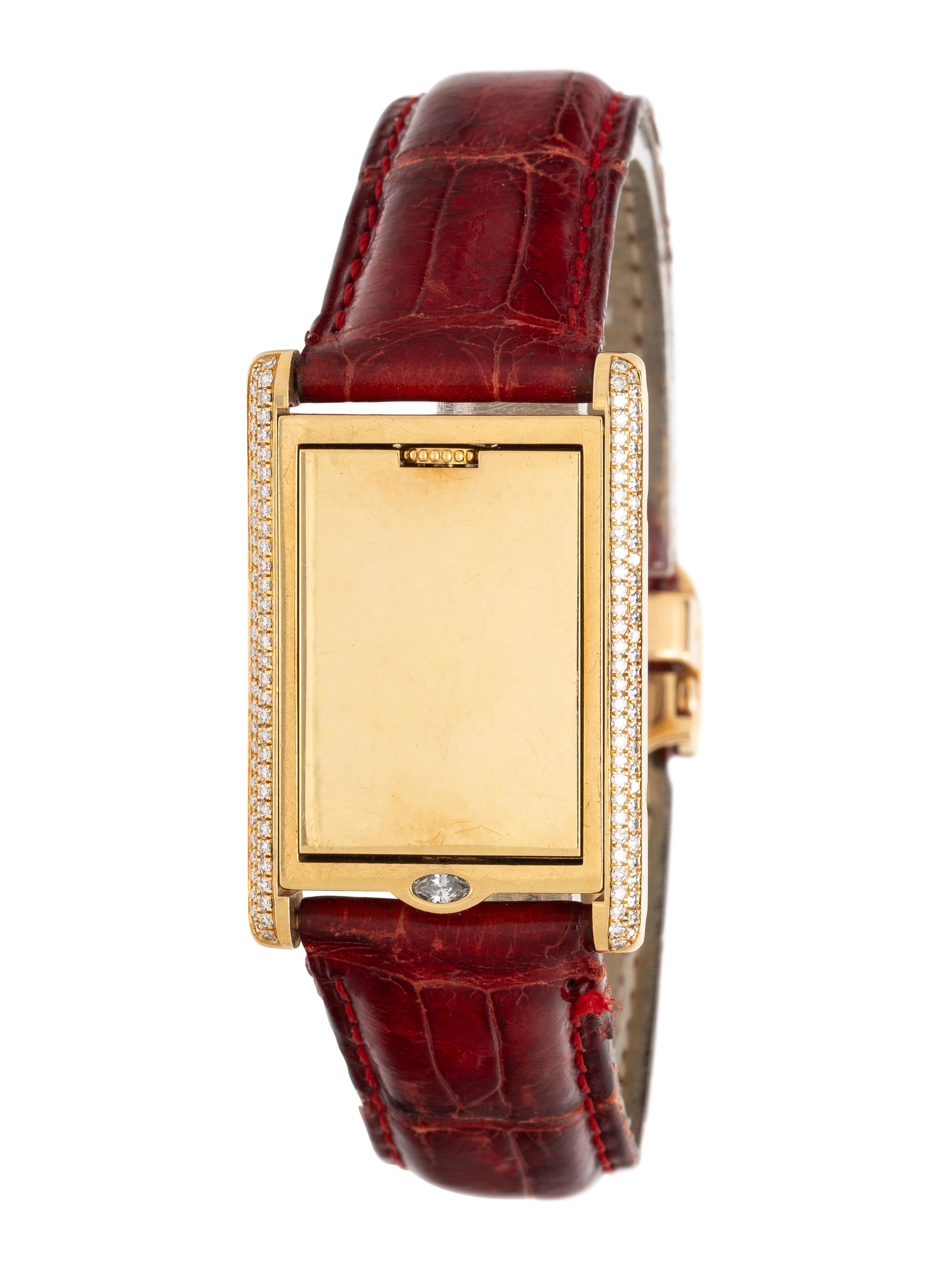 CARTIER, REF. 2506 18K YELLOW GOLD AND FACTORY DIAMOND 'TANK BASCULANTE' WATCH WITH CARTIER DEPLOYANT BUCKLE