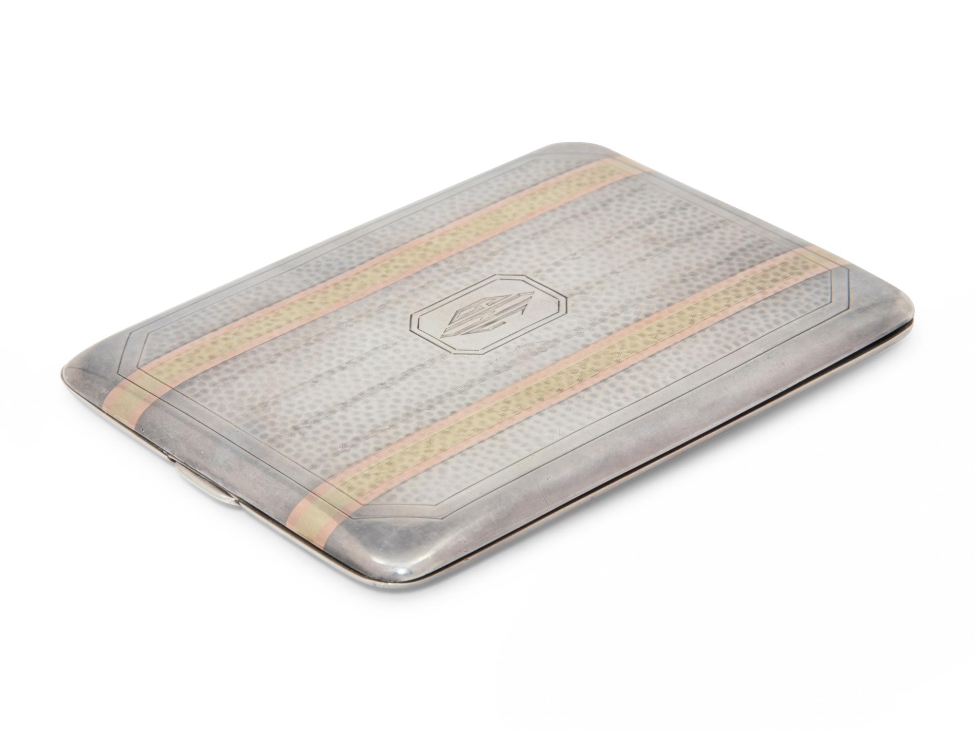 An American Silver and 14-Karat Gold Cigarette Case