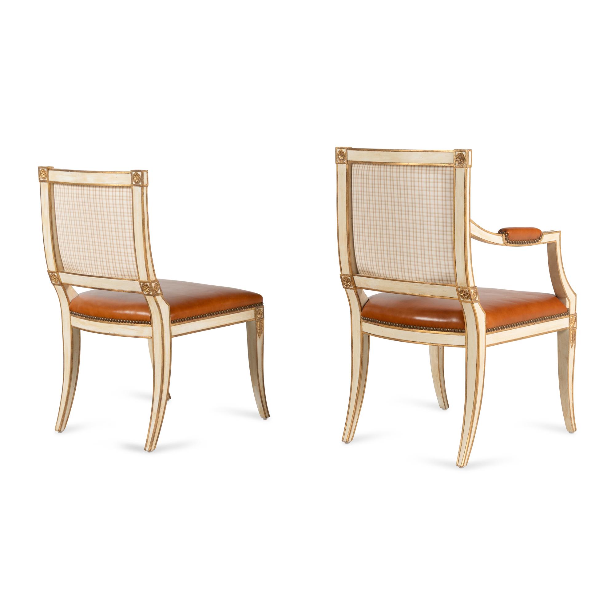 A Set of Twelve Italian Cream-Painted and Parcel Gilt Dining Chairs