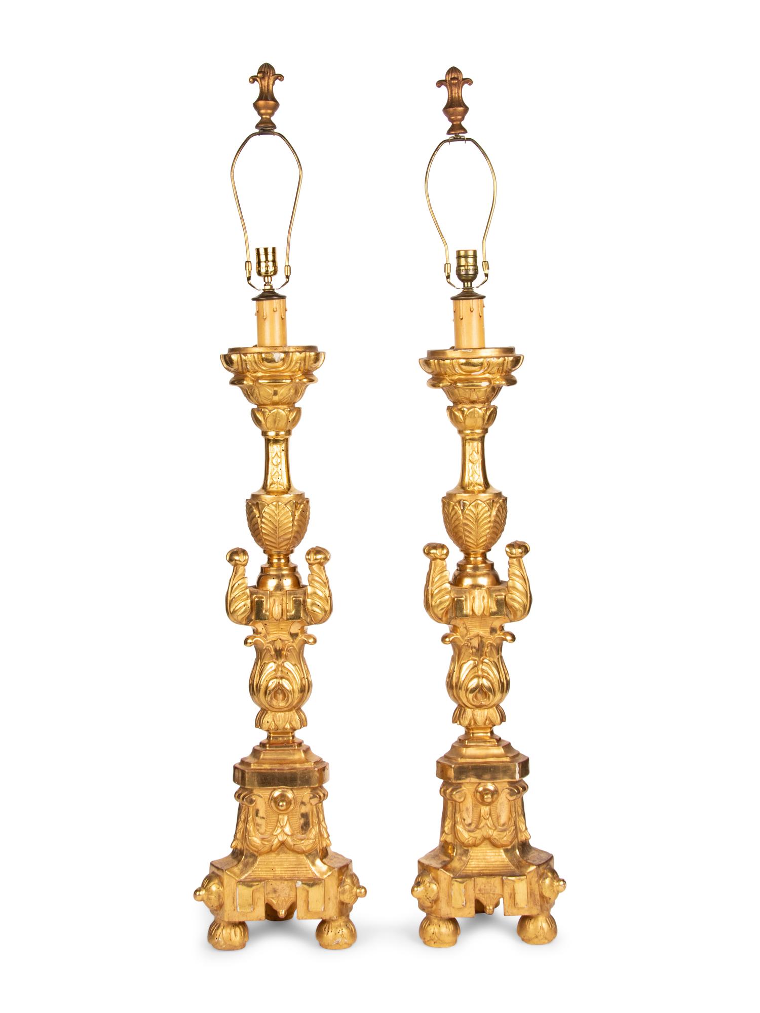 A Pair of Italian Giltwood Prickets Mounted as Lamps