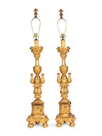 A Pair of Italian Giltwood Prickets Mounted as Lamps