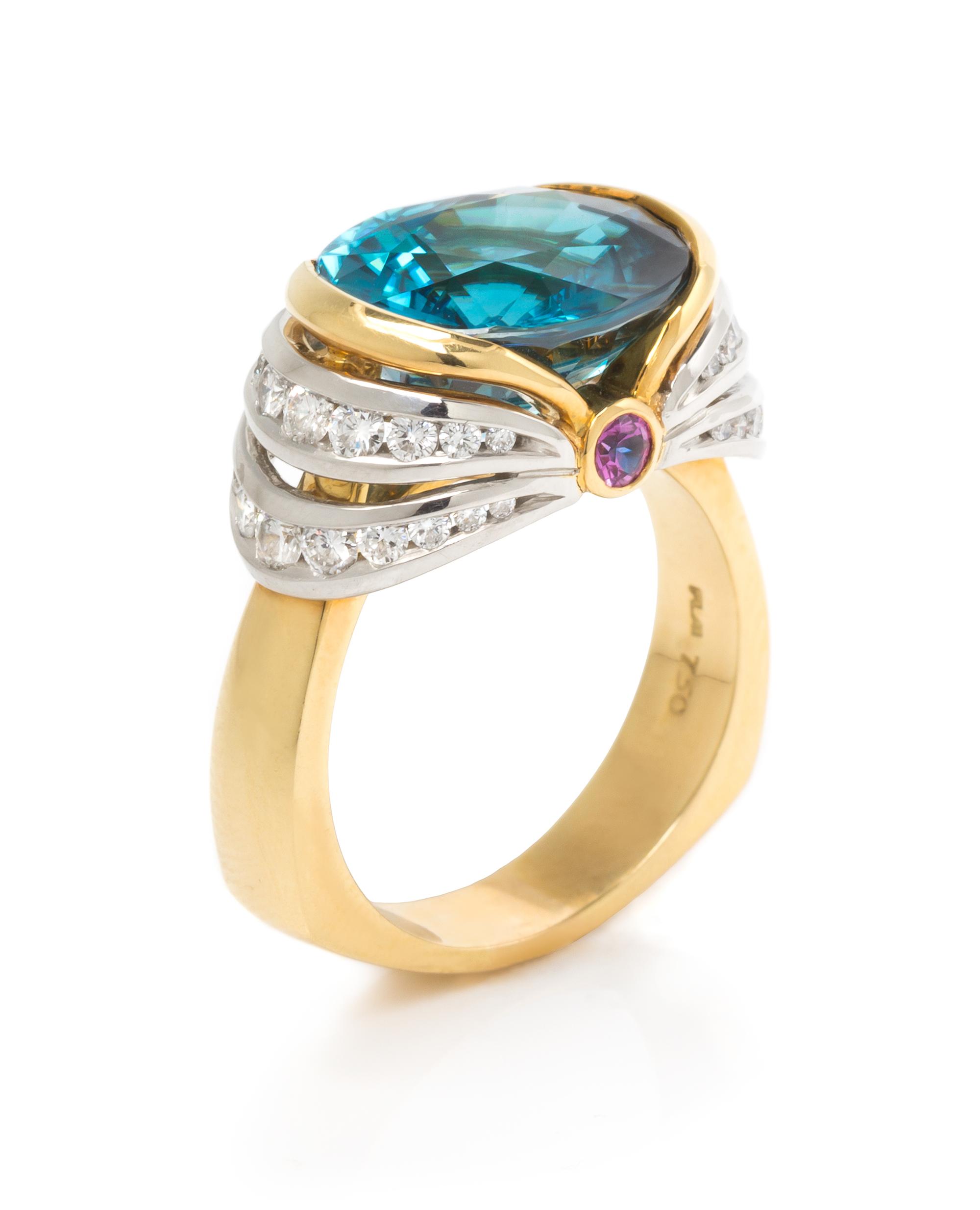An 18 Karat Yellow Gold, Platinum, Blue Zircon, Diamond, and Pink Sapphire Ring, Krementz, 10.00 dwts.