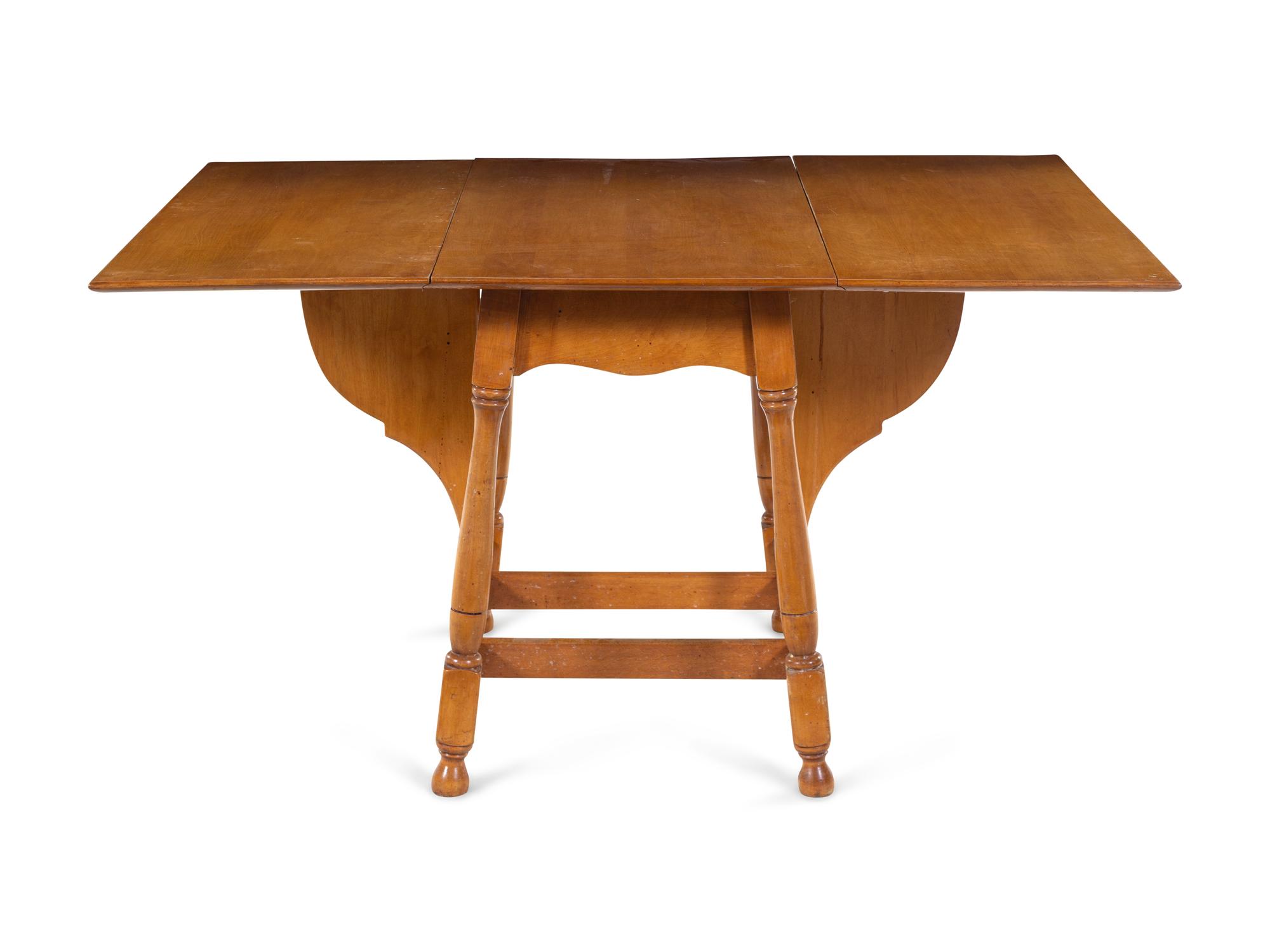 An American Maple Drop-Leaf Breakfast Table and Five Chairs