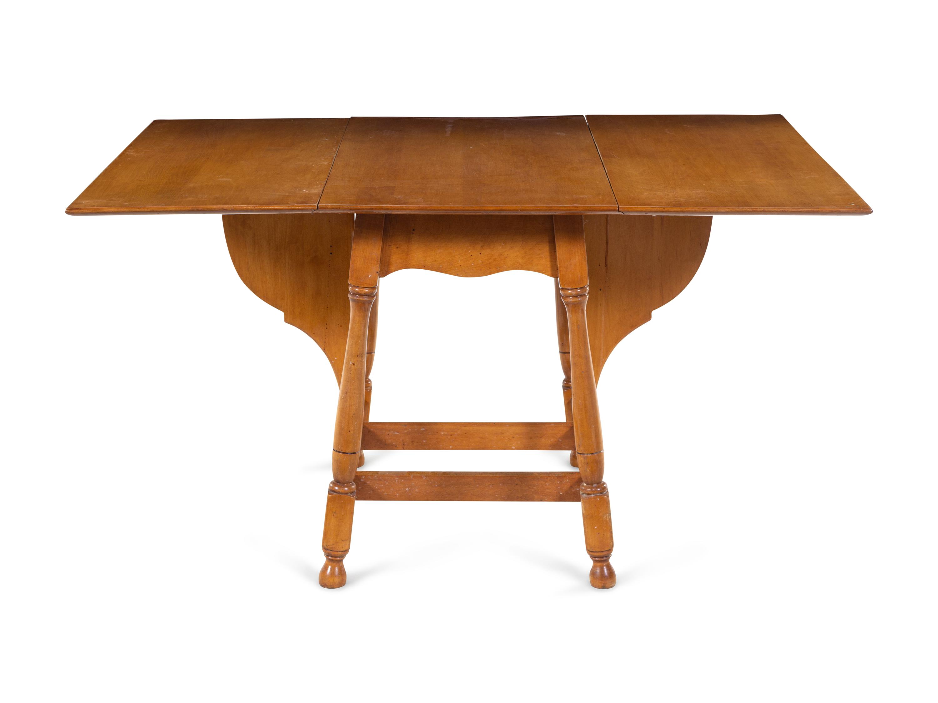 An American Maple Drop-Leaf Breakfast Table and Five Chairs