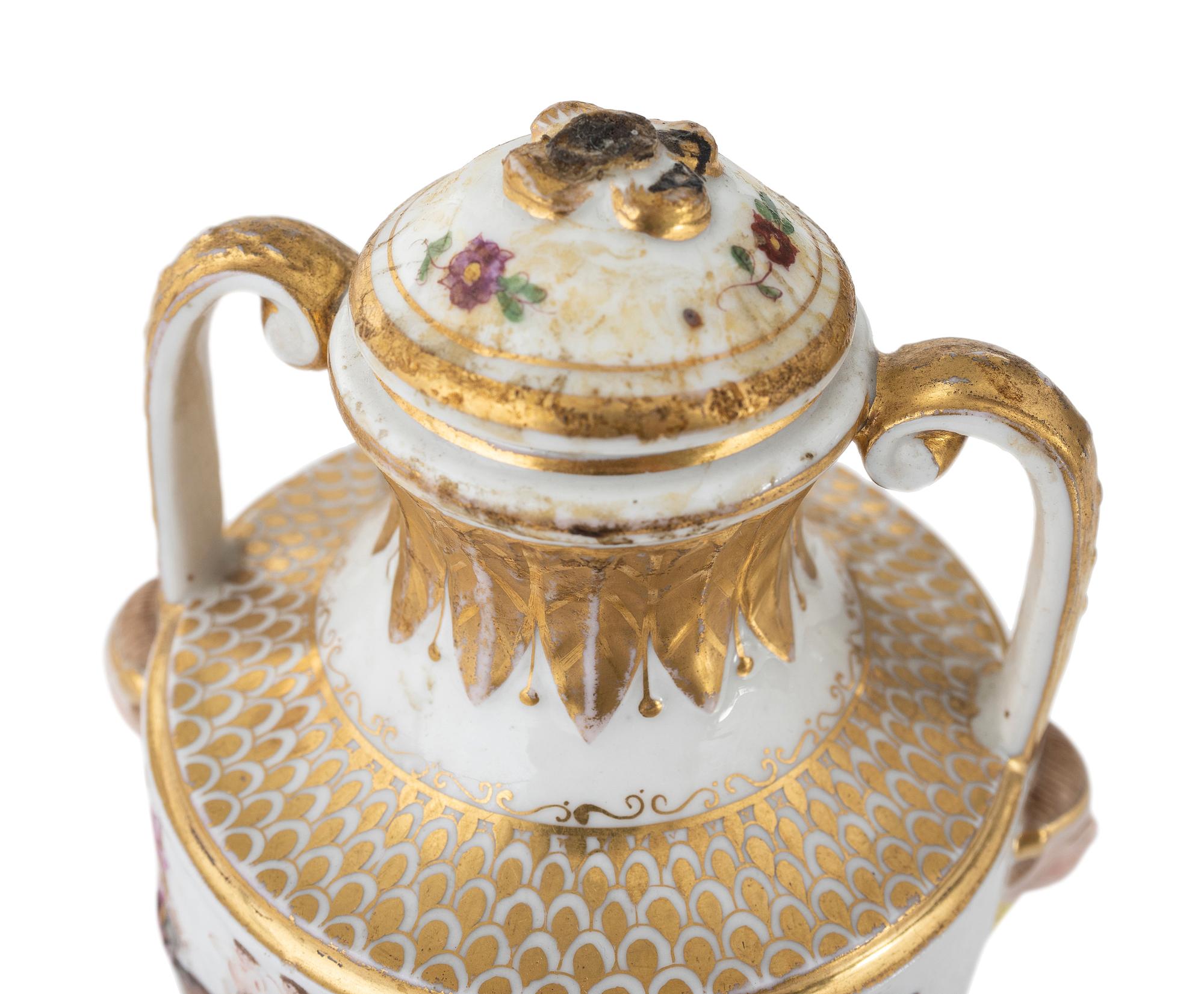 A Capodimonte Painted and Parcel-Gilt Porcelain Covered Urn