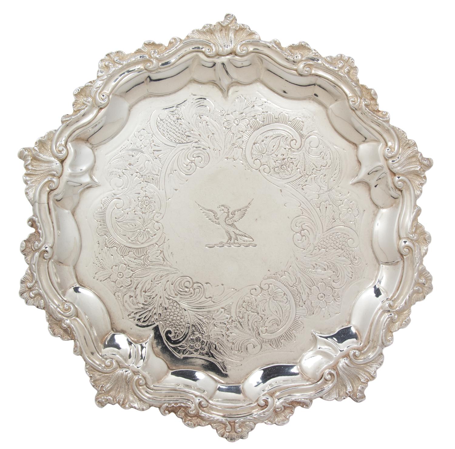 A William IV Silver Salver, Probably John Welby, London, 1834, with rocaille and C-scroll borders around an engraved band enclosing a b