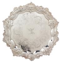 A William IV Silver Salver, Probably John Welby, London, 1834, with rocaille and C-scroll borders around an engraved band enclosing a b