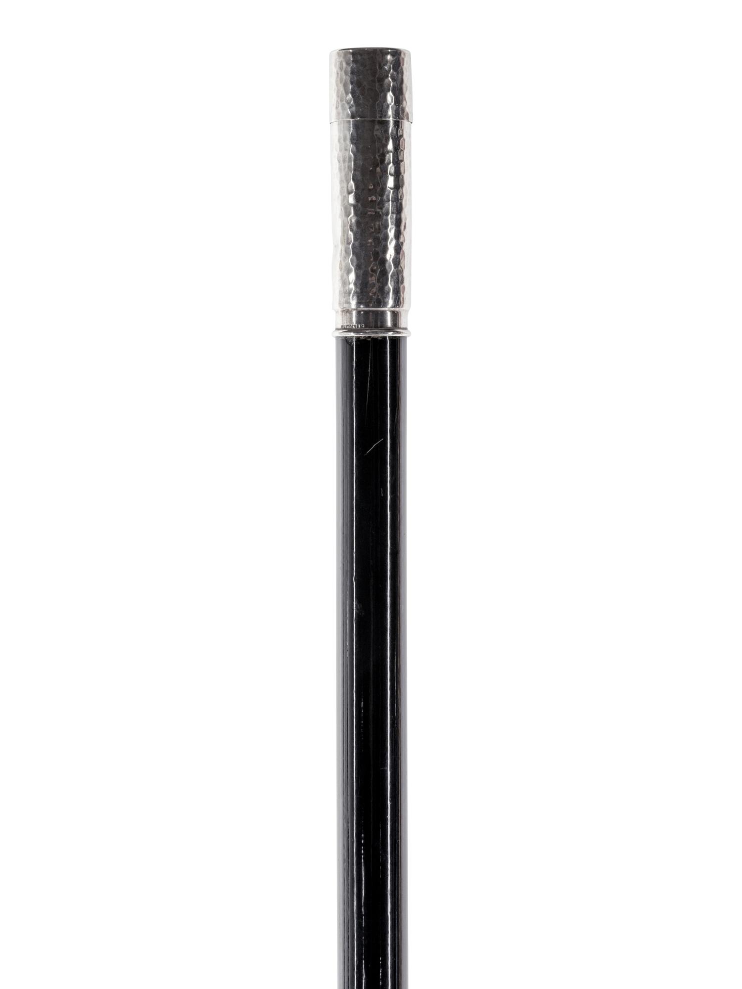 A Silver Mounted Ebonized Shaving Kit ' System' Walking Stick
