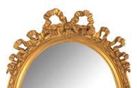 A Louis XVI Style Ribbon Decorated Parcel Gilt Mirror