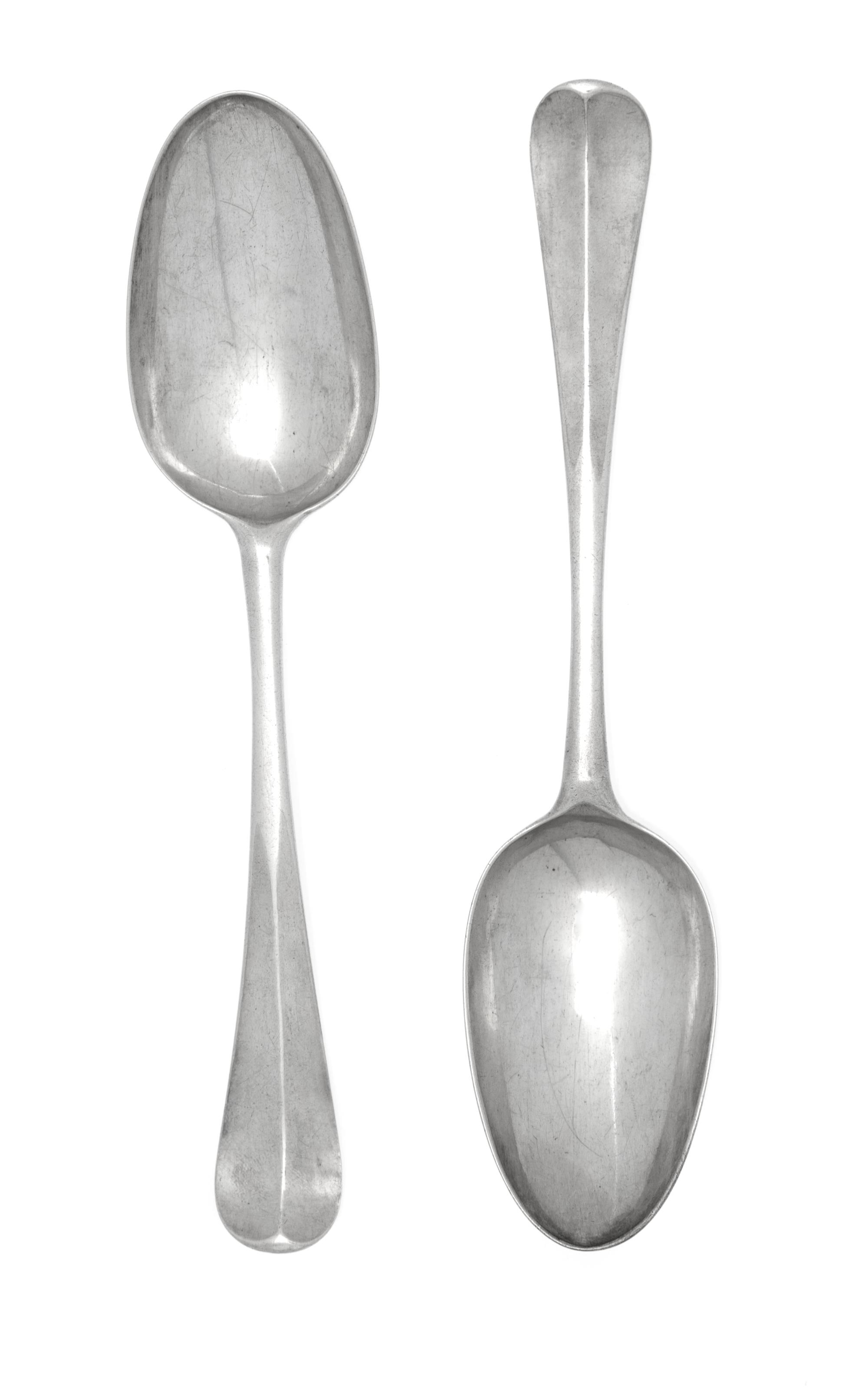 A Pair of George II Silver Table Spoons, Likely Dennis Wilks, London, 1739, the handle with an upturned end.