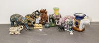A Collection of Eleven Chinese Elephant Figures Height of tallest 8 1/2 inches.