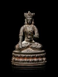 A Sino-Tibetan Bronze Figure of a Seated Crowned Buddha