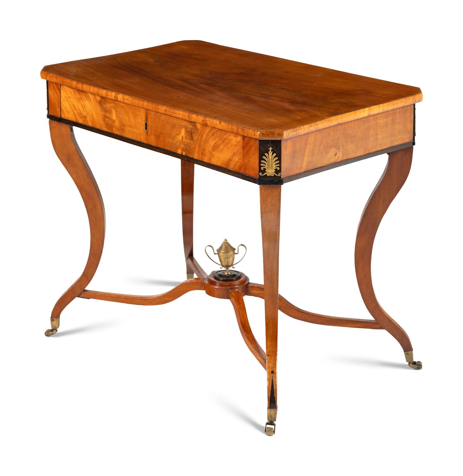 A Russian Neoclassical Part-Ebonized Bleached Mahogany Writing Table