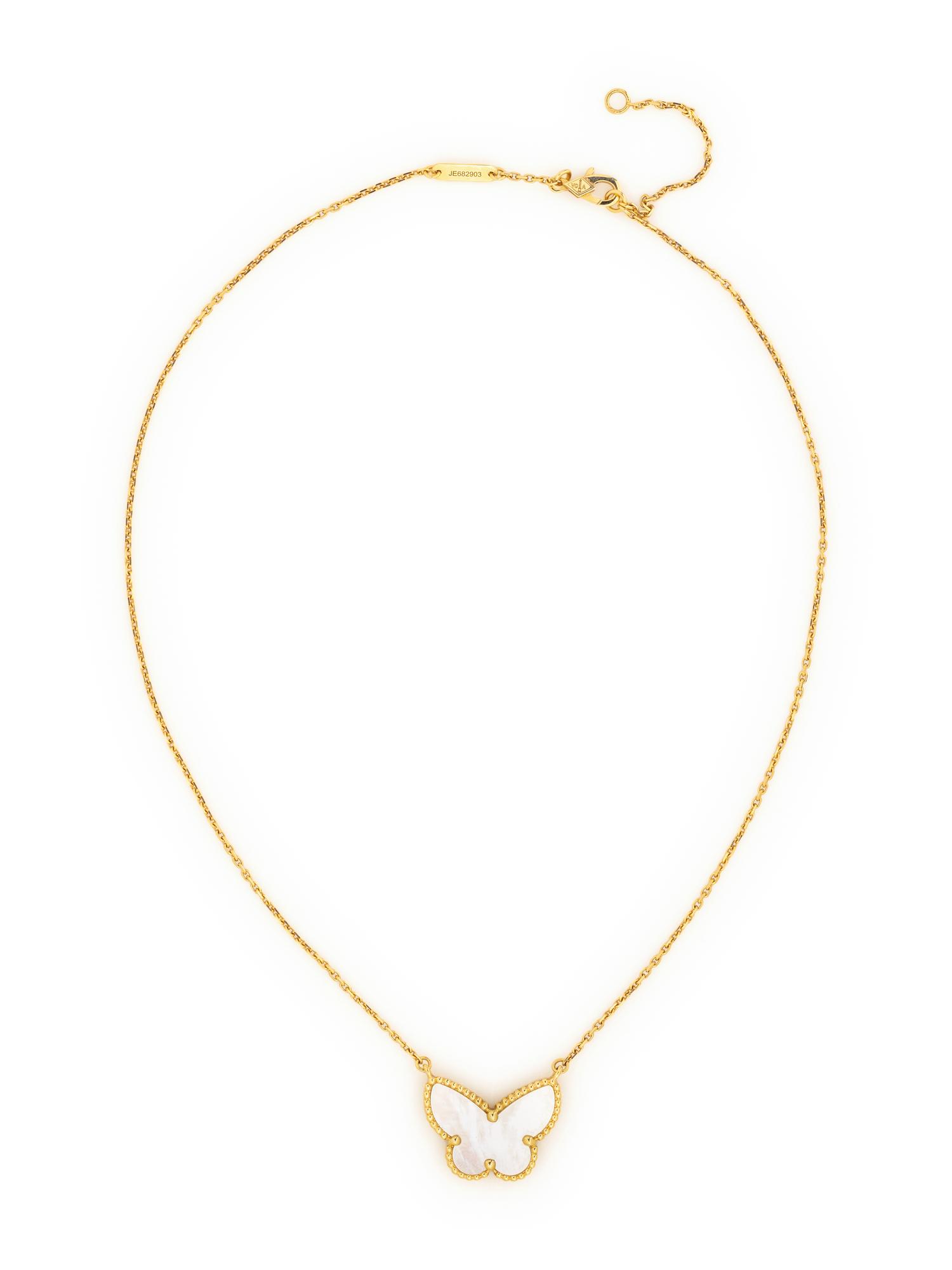 VAN CLEEF & ARPELS, YELLOW GOLD AND MOTHER-OF-PEARL 'LUCKY ALHAMBRA BUTTERFLY' NECKLACE
