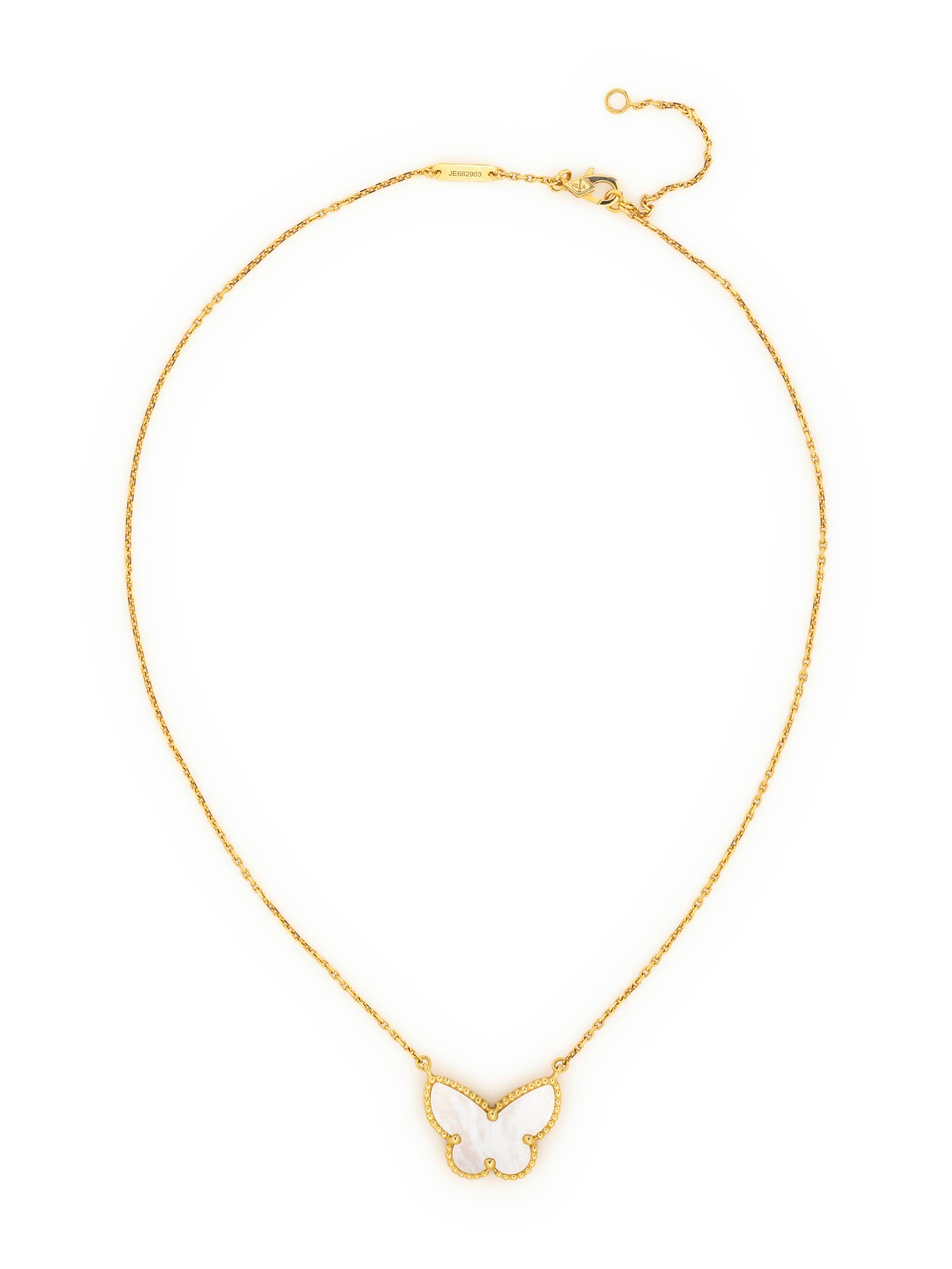 VAN CLEEF & ARPELS, YELLOW GOLD AND MOTHER-OF-PEARL 'LUCKY ALHAMBRA BUTTERFLY' NECKLACE