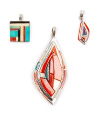 Group of three sterling silver pendants with stone inlay