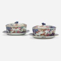 A pair of Chinese Export porcelain "Tobacco Leaf" butter tubs, covers, and stands circa 1775