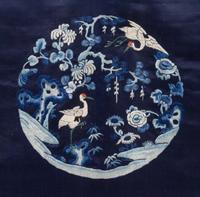 A Chinese Dark Blue Ground Embroidered Silk Lady's Robe
