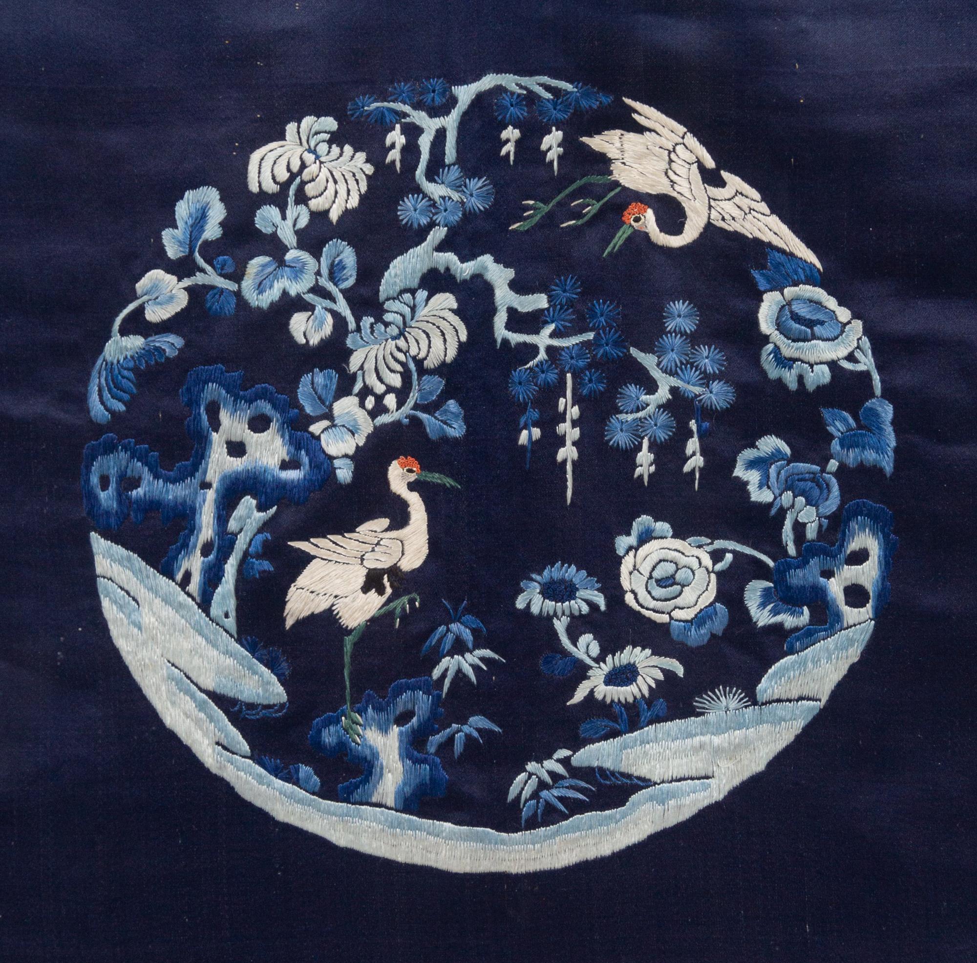 A Chinese Dark Blue Ground Embroidered Silk Lady's Robe