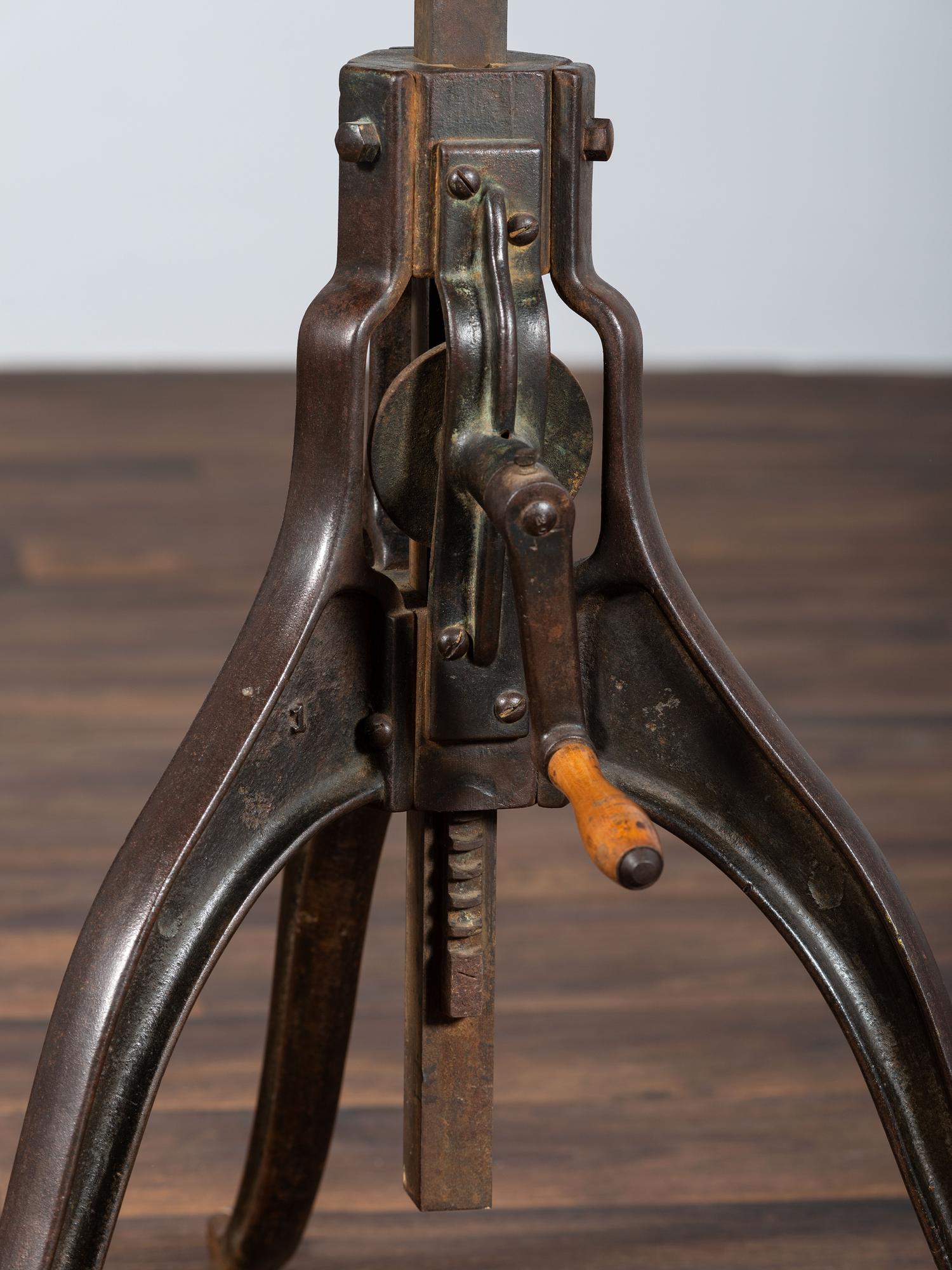 An Optometrist's Iron and Oak Adjustable Table