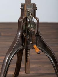 An Optometrist's Iron and Oak Adjustable Table