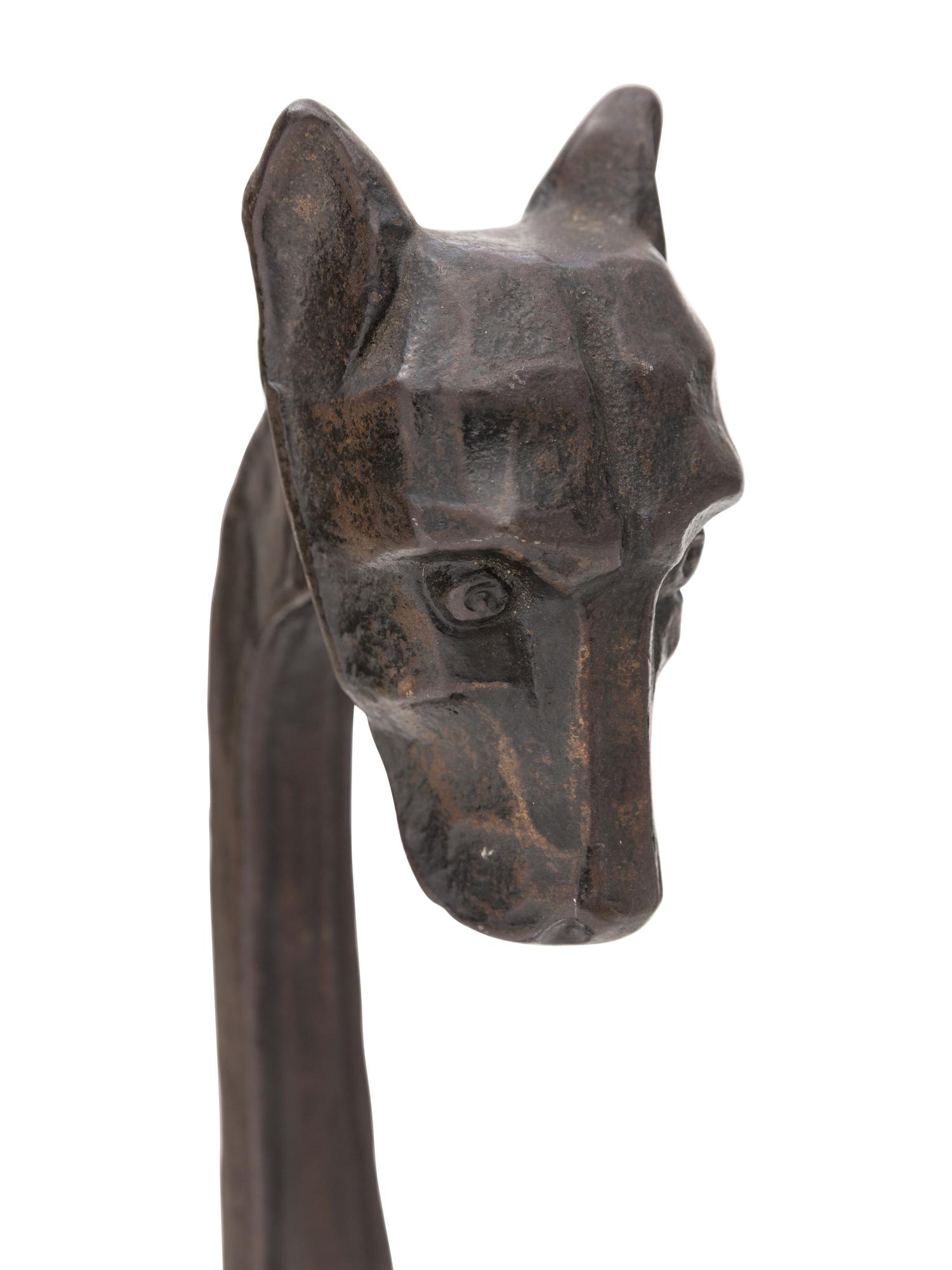 A Pair of Bradley and Hubbard Cast Iron Hound Andirons