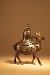 A Parcel-Gilt Bronze Figural-Form Incense Burner